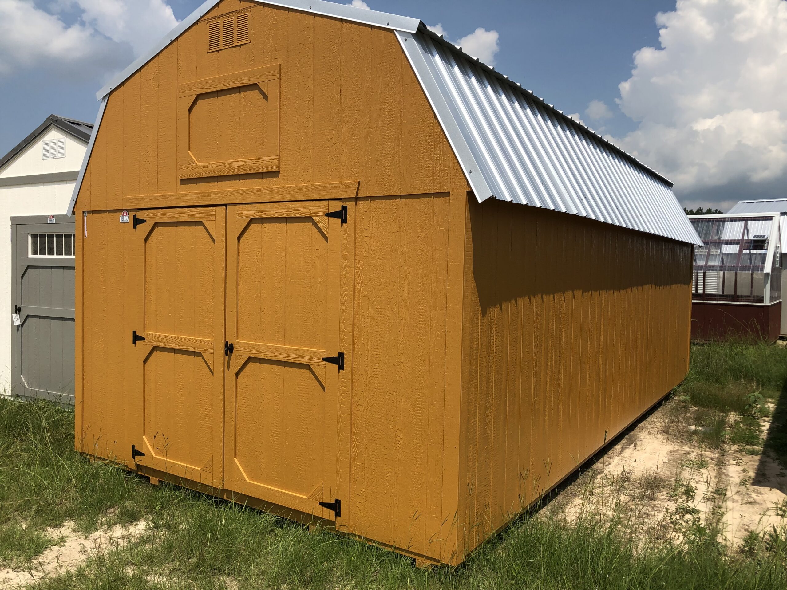 a shed coated with seminole cedar color stain
