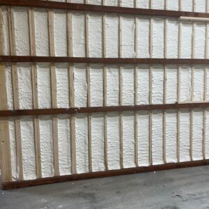 a large wall of spray foam insulation applied